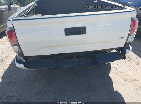 3TYDZ5BN2PT022400 2023 TOYOTA TACOMA White Widok z przodu