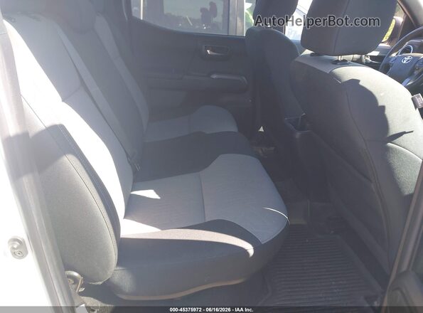 3TYDZ5BN2PT022400 2023 TOYOTA TACOMA White Widok naklejki z numerem VIN