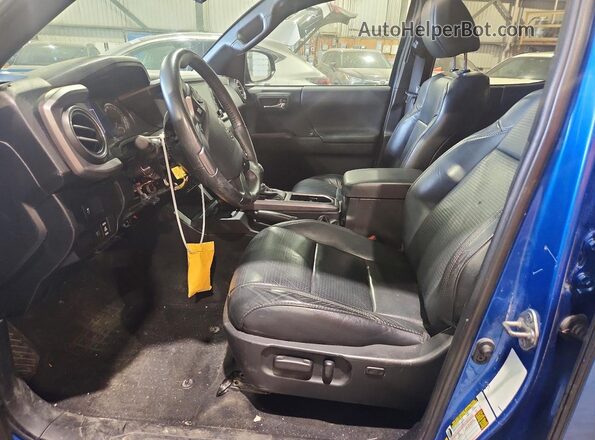 3TYDZ5BN5PT031317 2023 TOYOTA TACOMA Синий Вид салона спереди
