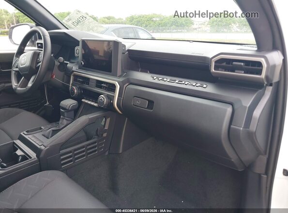 3TYJDAHNXTT043524 2026 TOYOTA TACOMA Белый Вид салона спереди