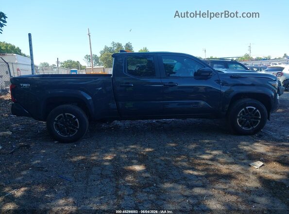 3TYLB5JN4TT116533 2026 TOYOTA TACOMA Gray Вид задньої частини салону