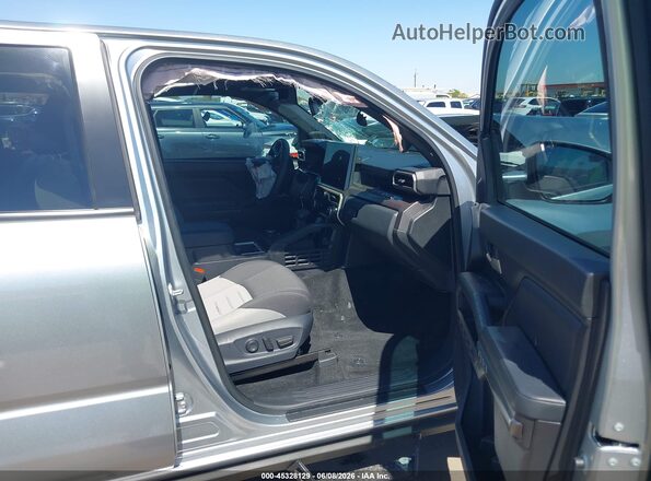3TYLC5LN2ST031750 2025 TOYOTA TACOMA HYBRID Серебряный Вид салона спереди