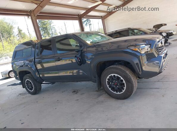 3TYLE5JN2ST075311 2025 TOYOTA TACOMA Gray Rear interior view