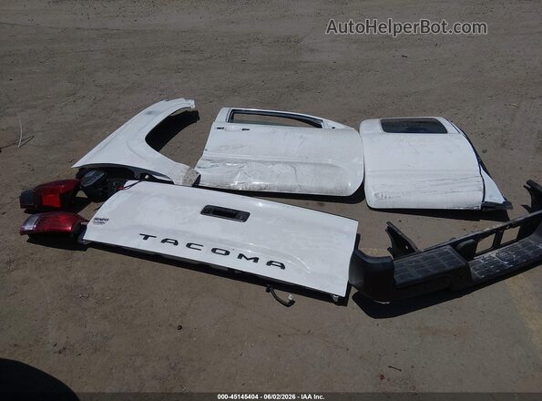 3TYRX5GN7PT071631 2023 TOYOTA TACOMA White Սարքավորումների վահանակի տեսք