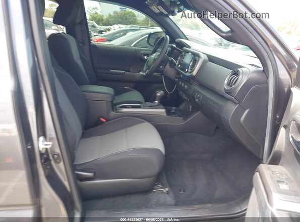 3TYRZ5CN0NT021859 2022 TOYOTA TACOMA Серый Вид салона спереди