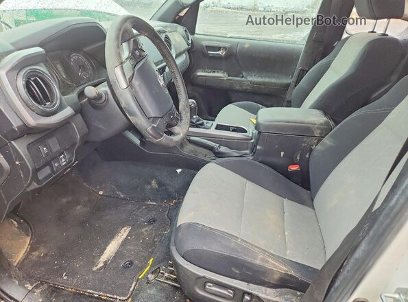 3TYSZ5AN0PT115697 2023 TOYOTA TACOMA White Front interior view