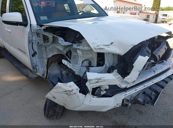 3TYSZ5AN4PT174557 2023 TOYOTA TACOMA White Դիմացի տեսք