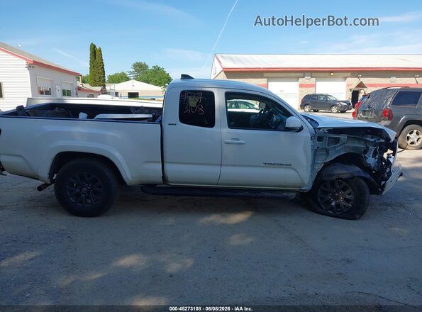 3TYSZ5AN4PT174557 2023 TOYOTA TACOMA White Սալոնի հետևի տեսք