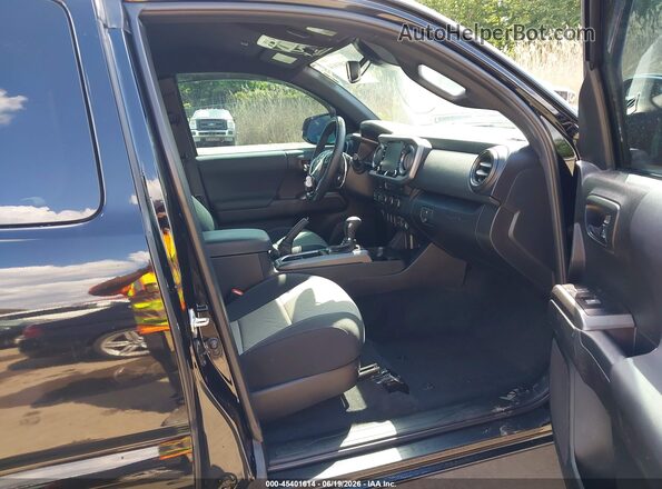 3TYSZ5AN6PT141849 2023 TOYOTA TACOMA Black Front interior view