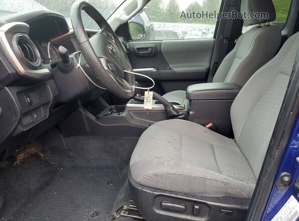 3TYSZ5AN7NT056211 2022 TOYOTA TACOMA Blue Front interior view