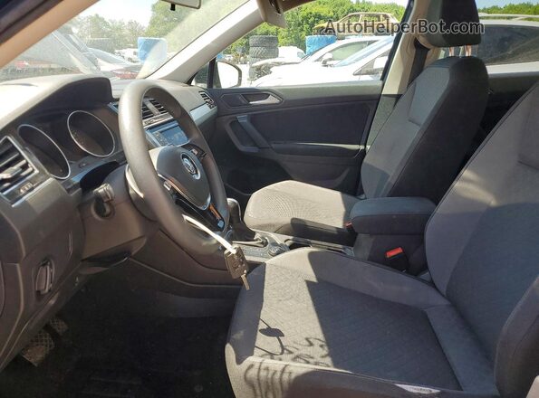 3VV0B7AX9KM065025 2019 VOLKSWAGEN TIGUAN Teal Front interior view