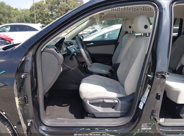 3VV1B7AX9MM004748 2021 VOLKSWAGEN TIGUAN Black Front interior view