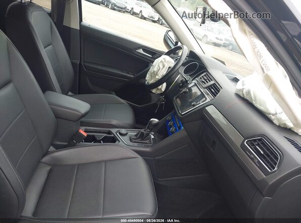 3VV2B7AX4KM092075 2019 VOLKSWAGEN TIGUAN Black Front interior view
