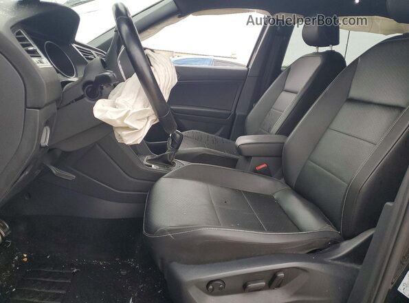 3VV2B7AX5MM121912 2021 VOLKSWAGEN TIGUAN Black Front interior view