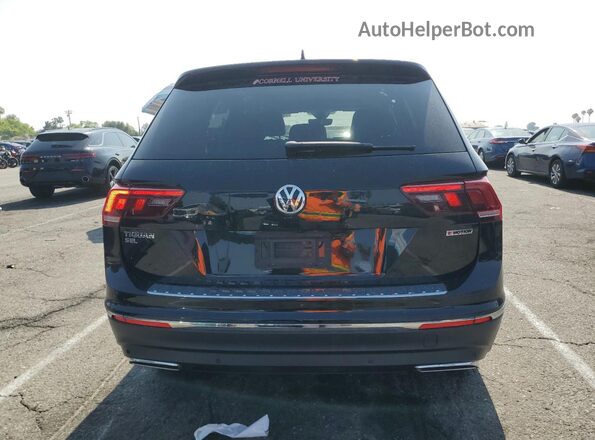 3VV2B7AX6LM142086 2020 VOLKSWAGEN TIGUAN Black Հետևի տեսք