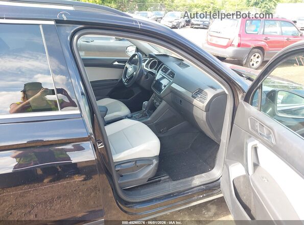 3VV2B7AX7KM194874 2019 VOLKSWAGEN TIGUAN Black Front interior view