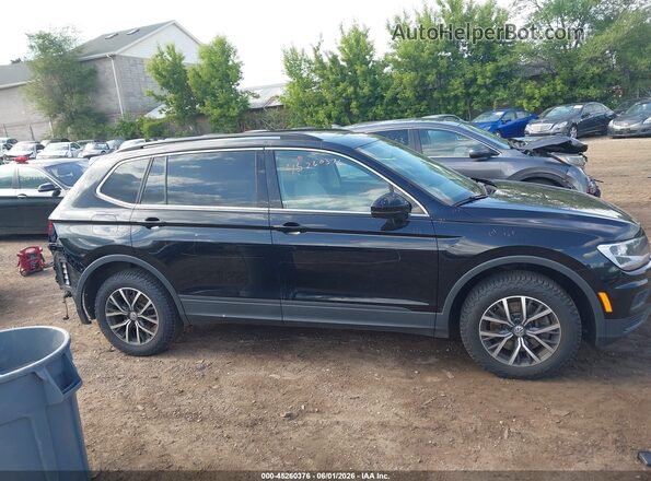 3VV2B7AX7KM194874 2019 VOLKSWAGEN TIGUAN Black Rear interior view