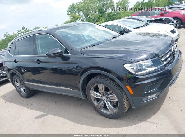 3VV2B7AX7MM127338 2021 VOLKSWAGEN TIGUAN Black Vista interior trasera