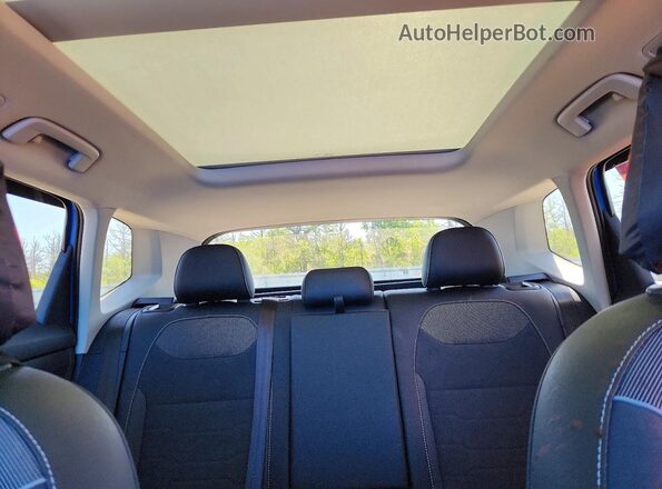 3VV2C7B28SM014317 2025 VOLKSWAGEN TAOS Blue Vista de los asientos traseros