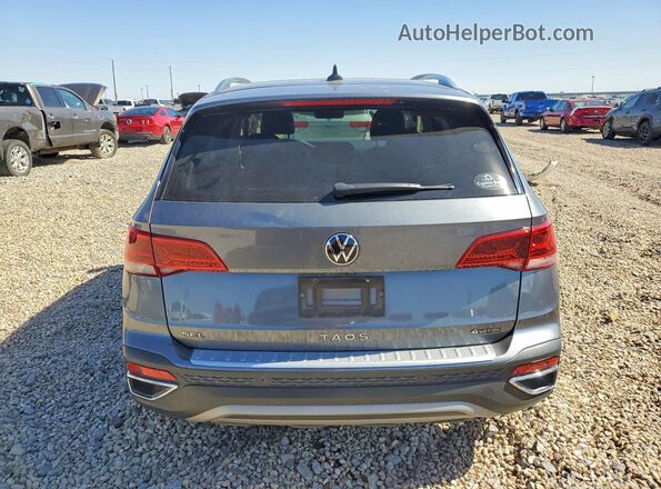 3VV2X7B26NM031075 2022 VOLKSWAGEN TAOS Gray Widok z tyłu