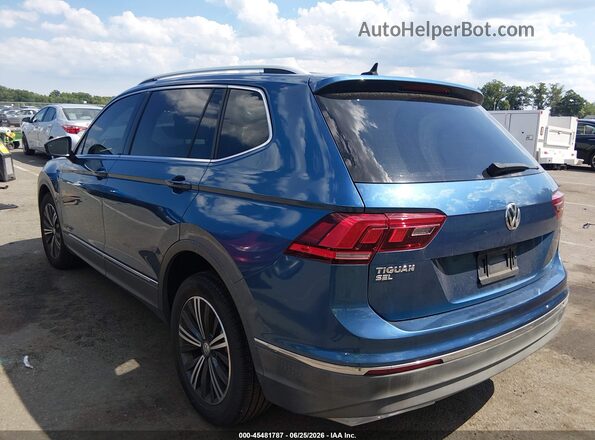 3VV3B7AX0JM021135 2018 VOLKSWAGEN TIGUAN Blue Trasero izquierdo