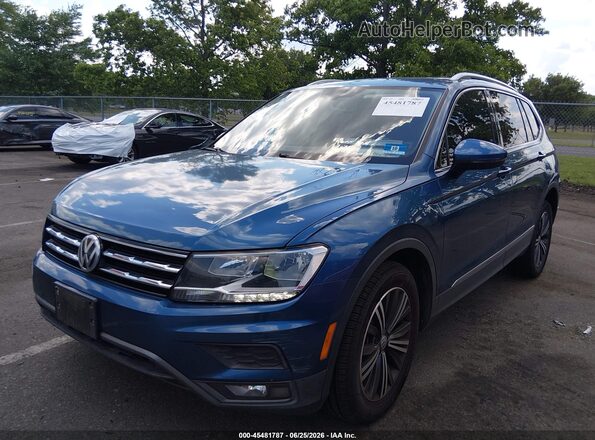 3VV3B7AX0JM021135 2018 VOLKSWAGEN TIGUAN Blue Vista tres cuartos delantera izquierda
