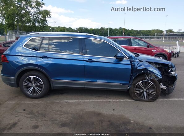3VV3B7AX0JM021135 2018 VOLKSWAGEN TIGUAN Blue Vista interior trasera