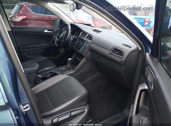 3VV3B7AX0JM021135 2018 VOLKSWAGEN TIGUAN Blue Vista interior delantera