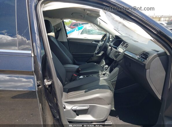 3VV3B7AX0PM101673 2023 VOLKSWAGEN TIGUAN Black წინა სალონის ხედი