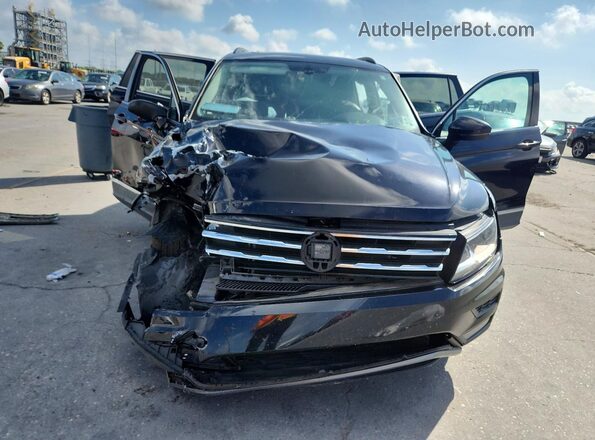 3VV3B7AX1JM008748 2018 VOLKSWAGEN TIGUAN Black Front view