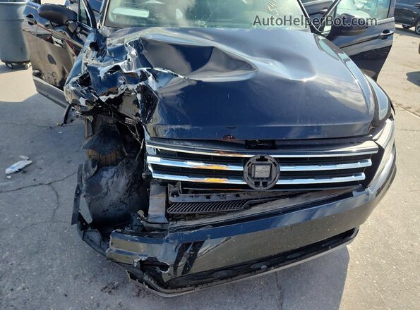 3VV3B7AX1JM008748 2018 VOLKSWAGEN TIGUAN Black Rear interior view