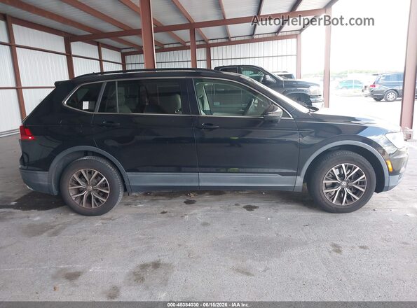 3VV3B7AX1KM106731 2019 VOLKSWAGEN TIGUAN Черный Вид задней части салона