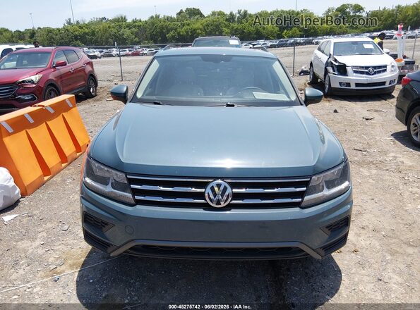 3VV3B7AX3MM040783 2021 VOLKSWAGEN TIGUAN Teal ხელსაწყოთა პანელის ხედი