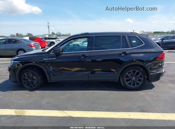 3VV3B7AX3PM115714 2023 VOLKSWAGEN TIGUAN Black Widok wnętrza z tyłu