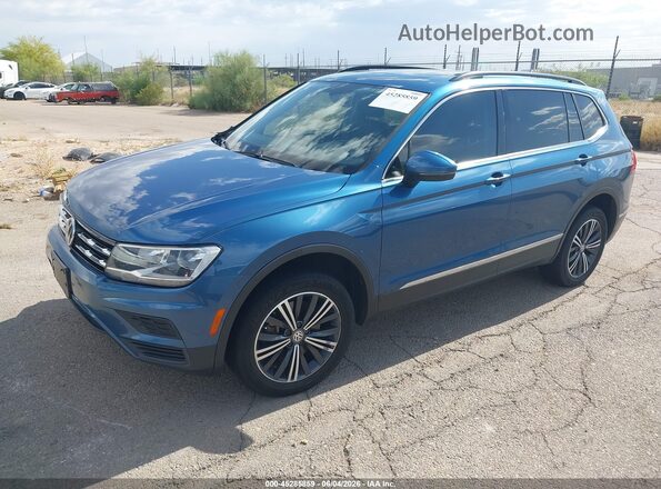 3VV3B7AX4JM040707 2018 VOLKSWAGEN TIGUAN Blue Front left