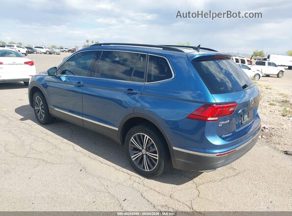 3VV3B7AX4JM040707 2018 VOLKSWAGEN TIGUAN Blue Rear left