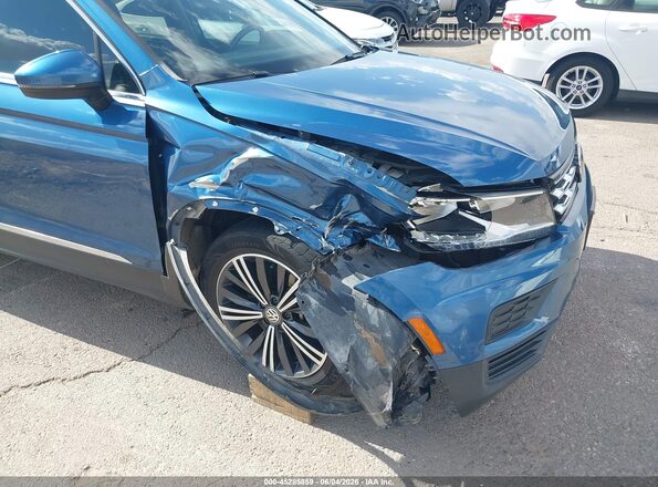 3VV3B7AX4JM040707 2018 VOLKSWAGEN TIGUAN Blue Front view