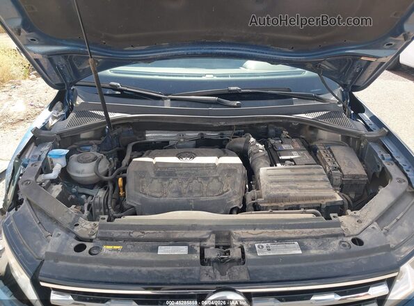 3VV3B7AX4JM040707 2018 VOLKSWAGEN TIGUAN Blue Rear view