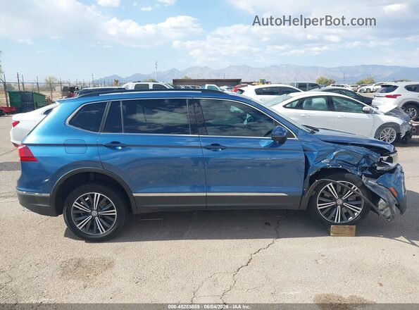 3VV3B7AX4JM040707 2018 VOLKSWAGEN TIGUAN Blue Rear interior view
