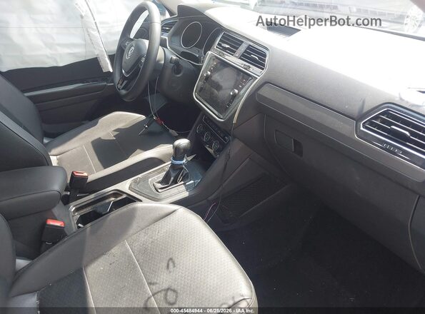 3VV3B7AX4LM018130 2020 VOLKSWAGEN TIGUAN Blue წინა სალონის ხედი