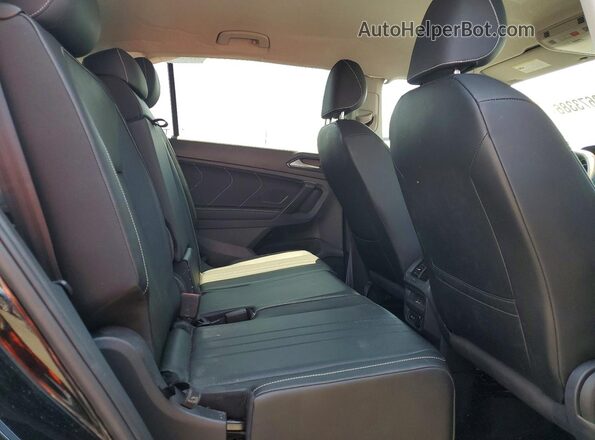 3VV3B7AX4PM115124 2023 VOLKSWAGEN TIGUAN Black Vista interior trasera
