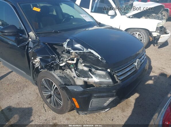 3VV3B7AX6JM009328 2018 VOLKSWAGEN TIGUAN Black Widok z przodu