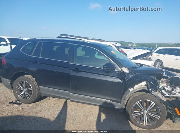 3VV3B7AX6JM009328 2018 VOLKSWAGEN TIGUAN Black Widok wnętrza z tyłu