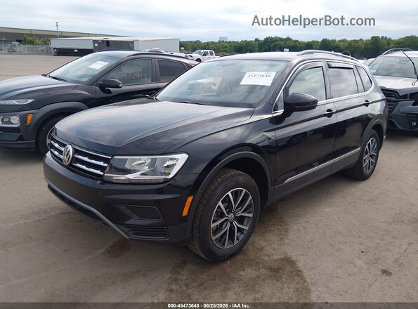 3VV3B7AX6LM080838 2020 VOLKSWAGEN TIGUAN Black Առջևի ձախ երեք քառորդ տեսարան