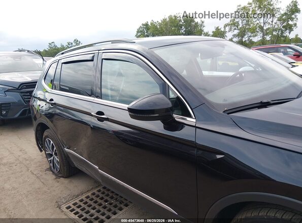 3VV3B7AX6LM080838 2020 VOLKSWAGEN TIGUAN Black Սալոնի հետևի տեսք