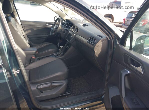 3VV3B7AX7KM130905 2019 VOLKSWAGEN TIGUAN Green Front interior view