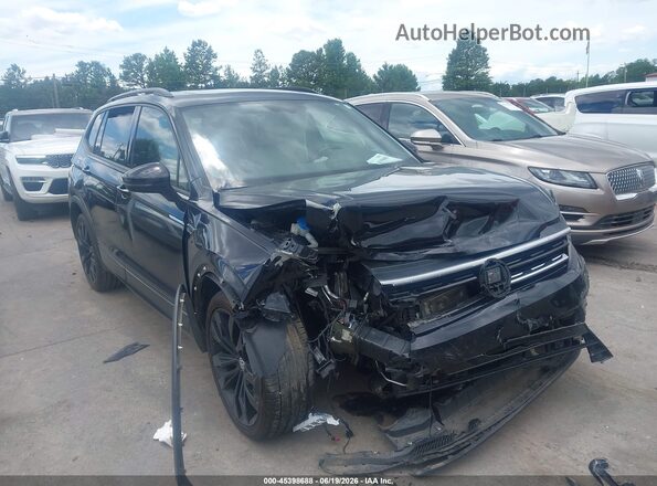 3VV3B7AX7MM049406 2021 VOLKSWAGEN TIGUAN Black Սալոնի հետևի տեսք