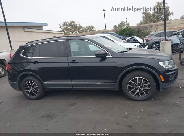 3VV3B7AX7MM065248 2021 VOLKSWAGEN TIGUAN Black Սալոնի հետևի տեսք