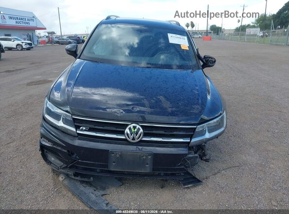 3VV3B7AX7MM154902 2021 VOLKSWAGEN TIGUAN Black Widok wnętrza z tyłu