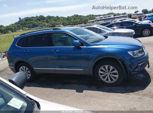 3VV3B7AX8JM047238 2018 VOLKSWAGEN TIGUAN Blue Vista interior trasera